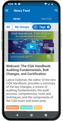 Cell phone with ASQ app newsfeed content appearing on screen.